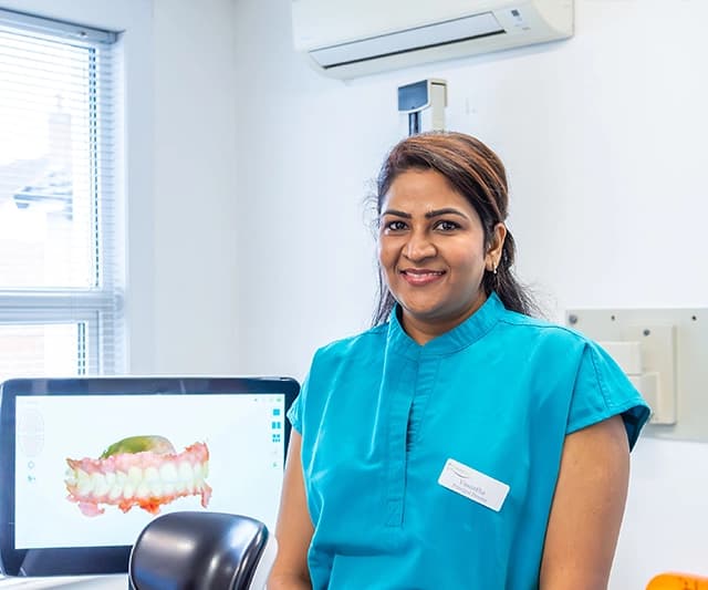 Dental implant model showing replacement tooth treatment