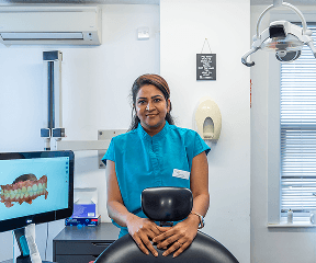 Dental check-up to review restored teeth and gums